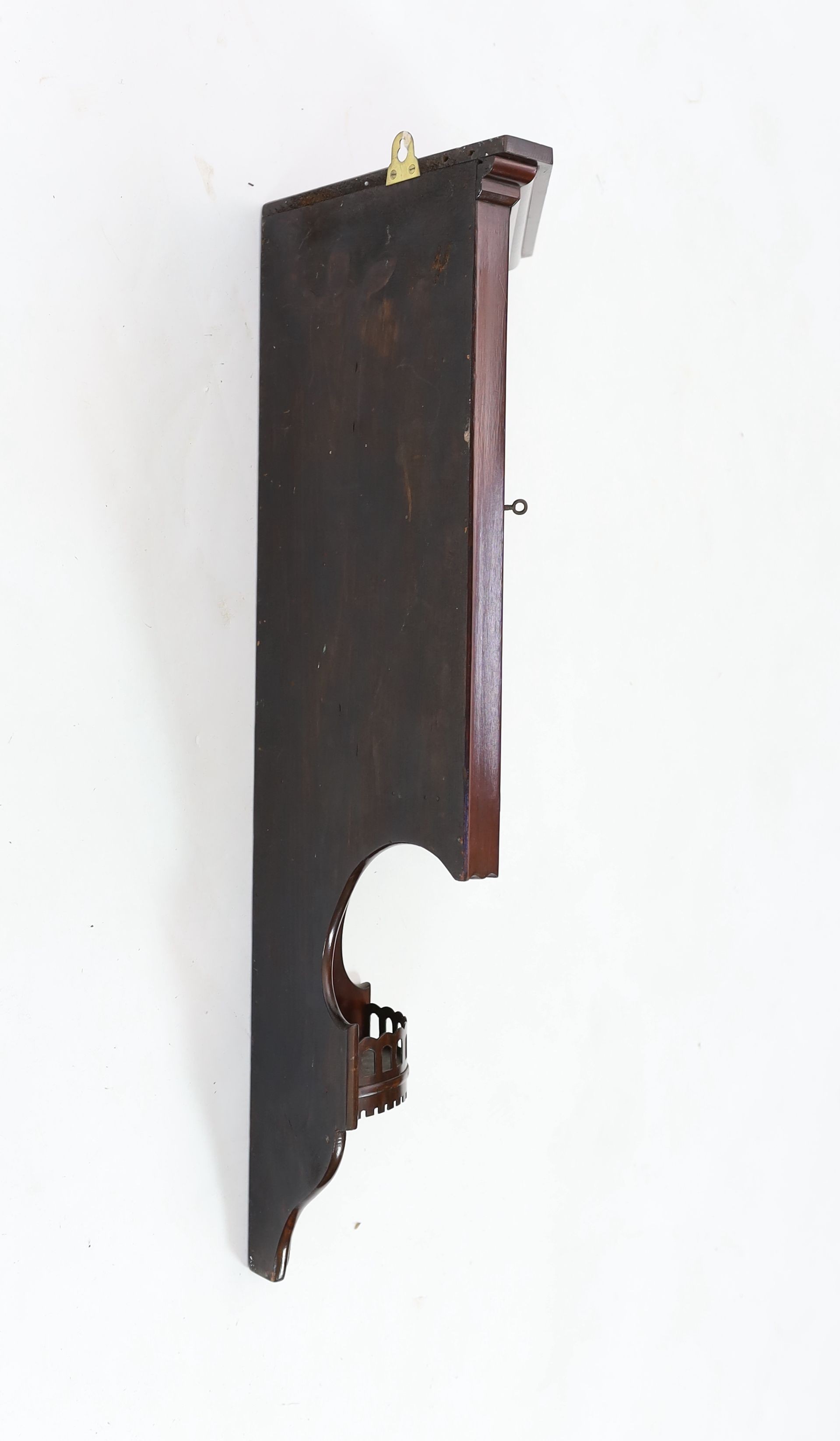 An Edwardian mahogany hanging corner cabinet, width 33cm height 90cm